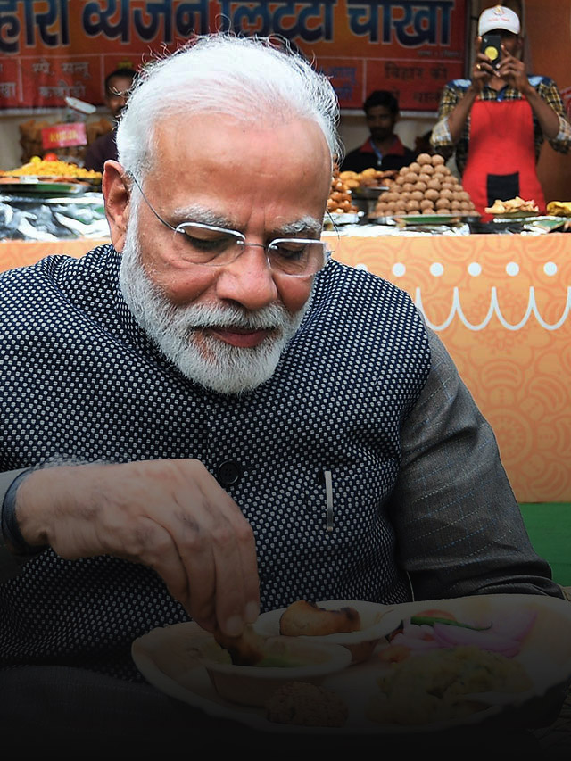 Modi having meal